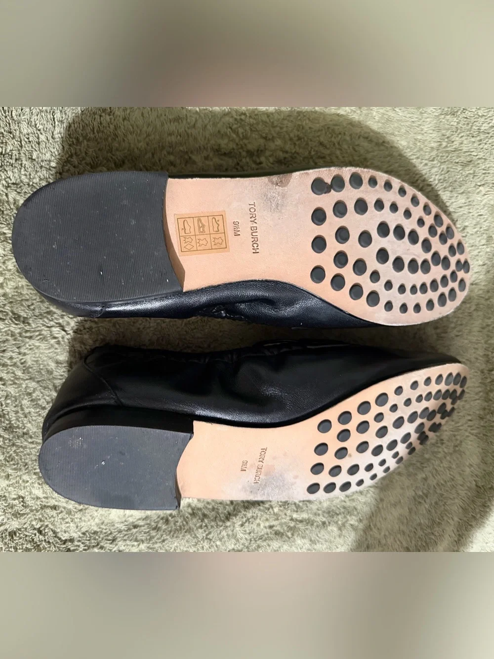 Tory Burch Black Leather Slip-On Loafers with Gold Emblem